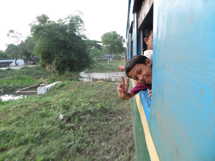 This was on a 3 hour train ride on a commuter train around the city that we took with the locals.  This little boy tried to buy me a bag of oranges.  He was so sweet!