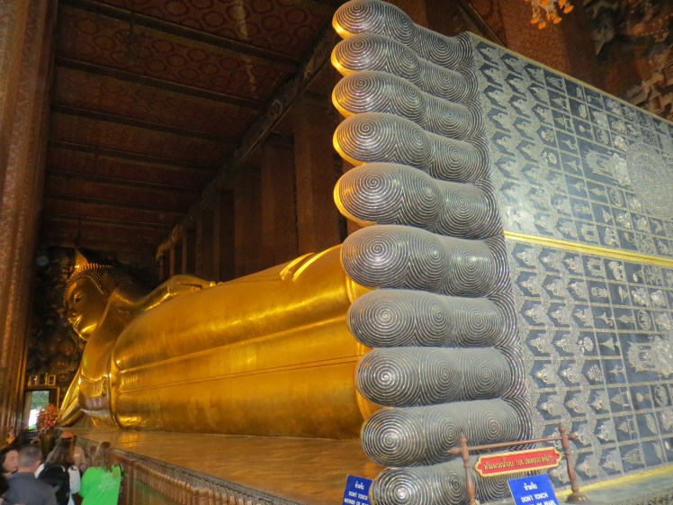 The Reclining Buddha at Wat Pho in Bangkok, Thailand.