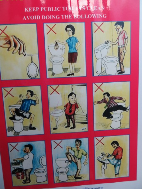 Apparently people standing on toilets are a problem in Bangkok.