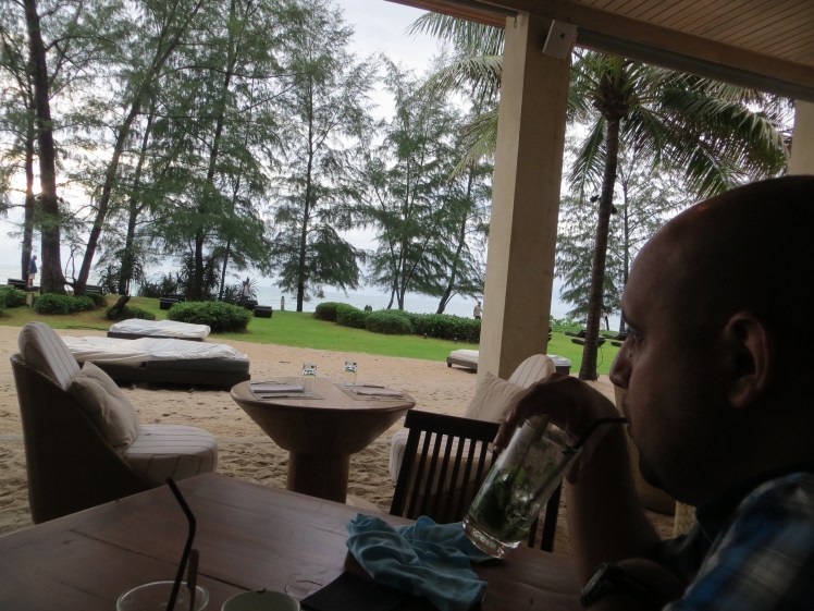 Enjoying mojitos at the beachside bar.  And yes, that is some sun that was peeking through the clouds.