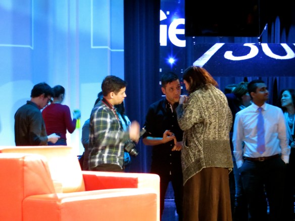 George discussing things with his people between takes.  