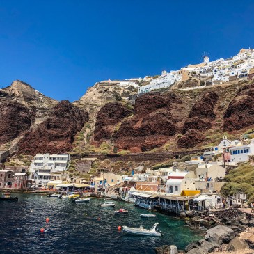 Amoudi Bay, Santorini with the town of Oia at the top of the cliff.